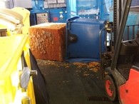 The block of solidified waste tipped over, breaking a worker's leg