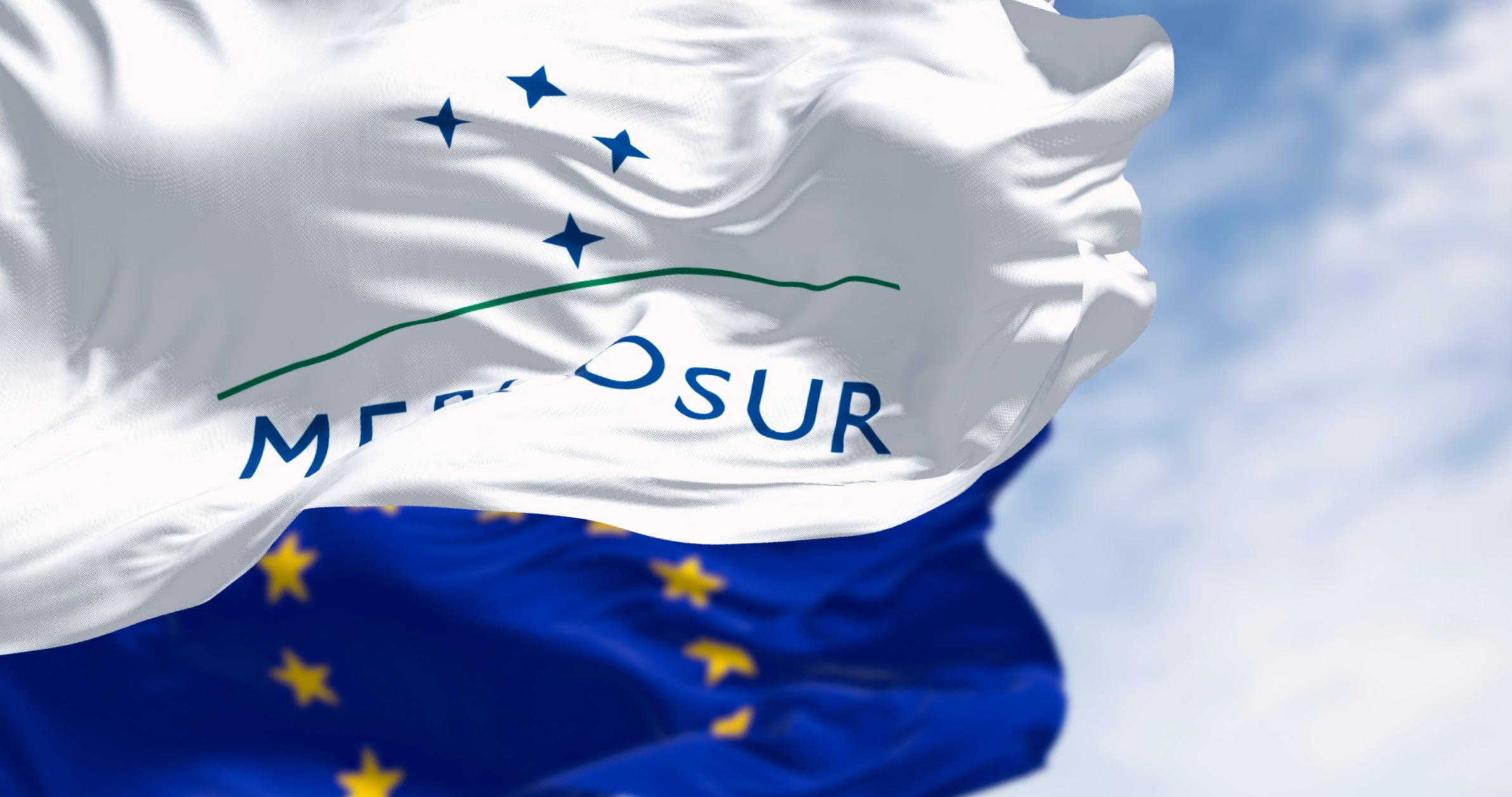 Flags of Mercosur and EU trading blocs