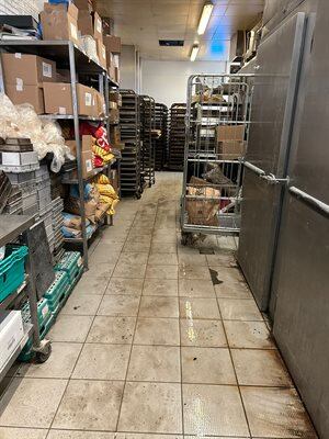 A dirty bakery floor.