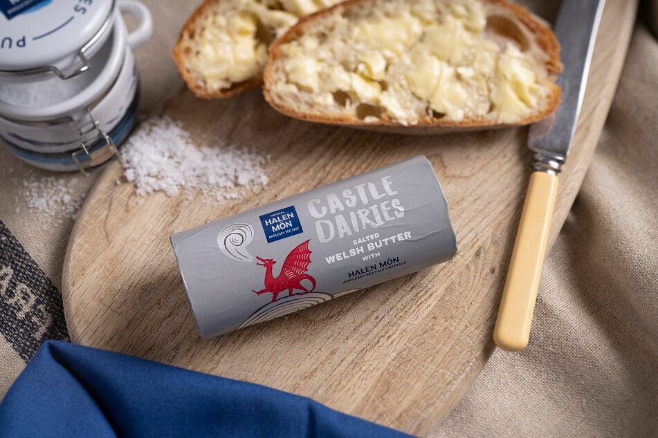 Castle-Dairies-Welsh-Butter-with-Halen-Mon-natural-sea-salt-landscape.jpg
