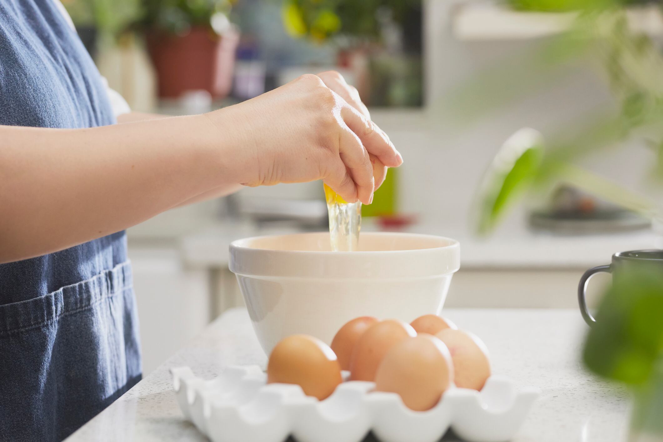 Eggs being broken.