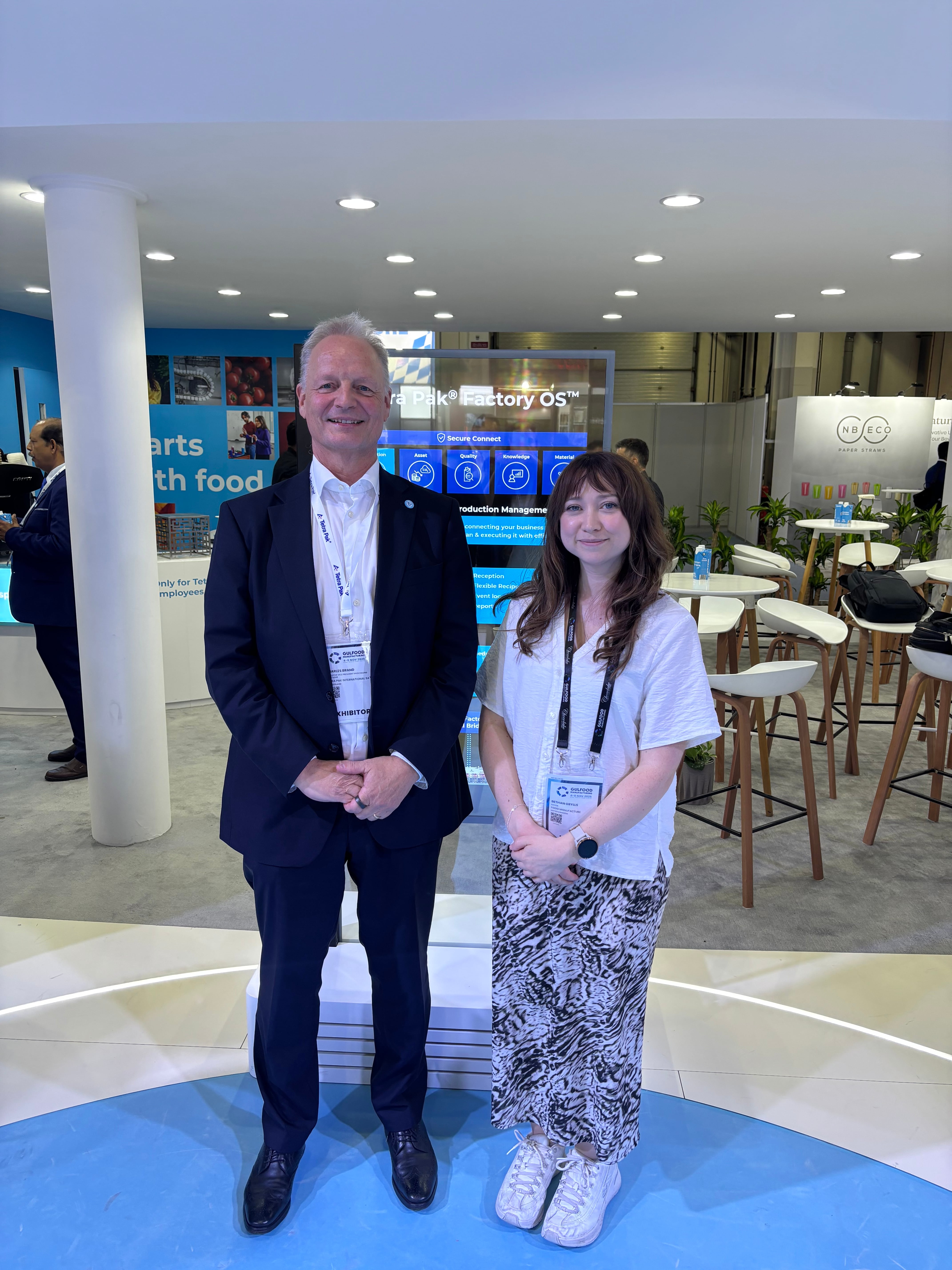 Charles Brand, executive vice president for processing solutions & equipment with Bethan Grylls, editor of Food Manufacture at the Tetra Pak stand at Gulfood 2025.