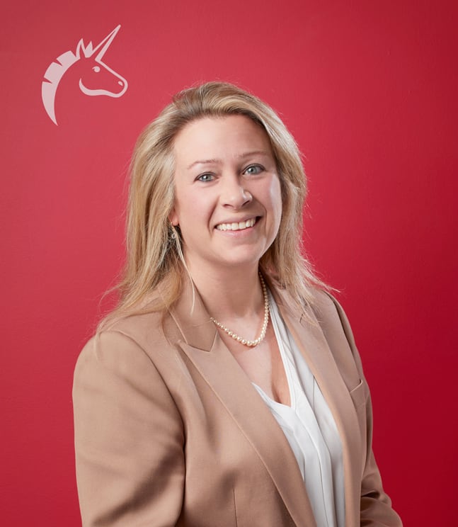 A corporate headshot of a woman