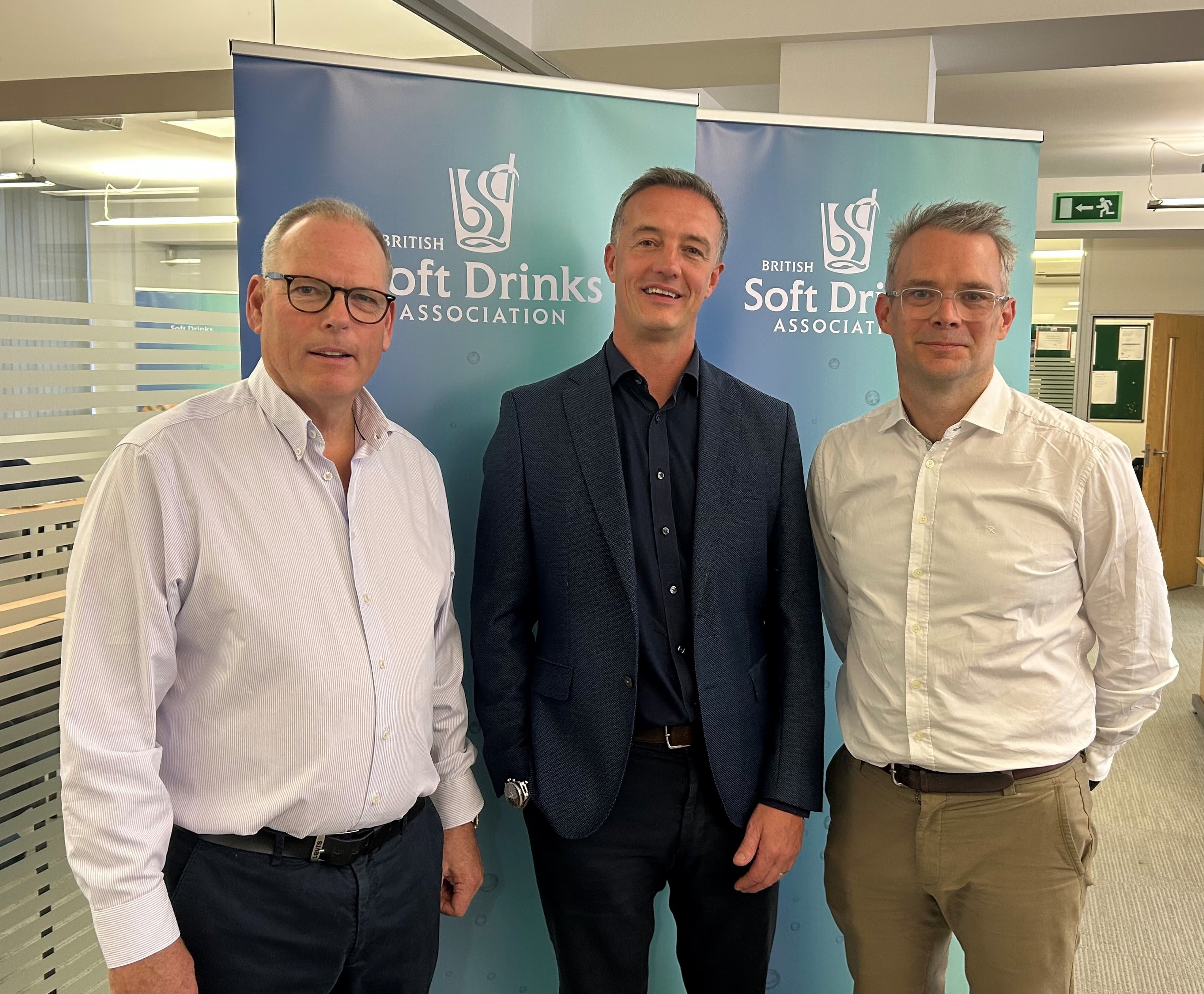 A corporate shot of three men