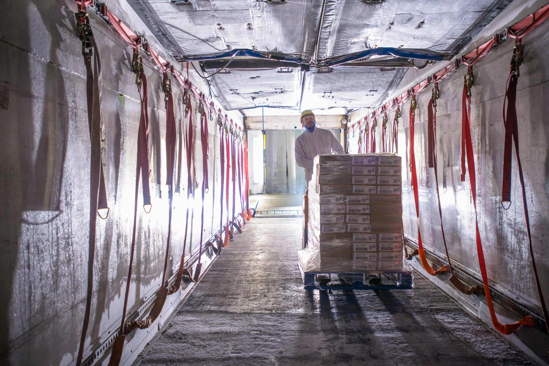 Frozen food being loaded into a lorry.