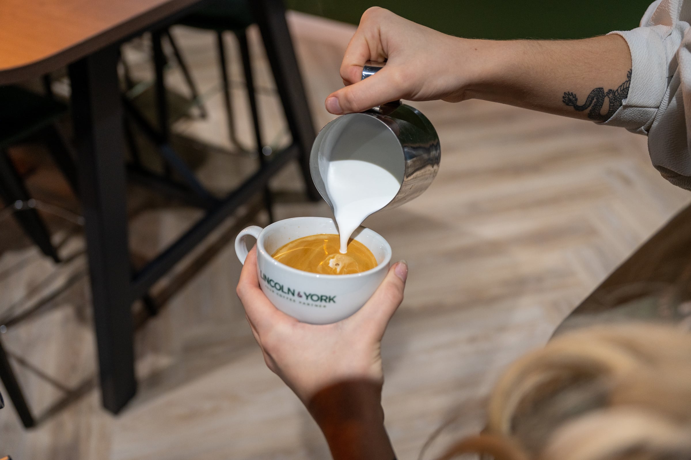 Lattee being made in Lincoln & York branded cup.