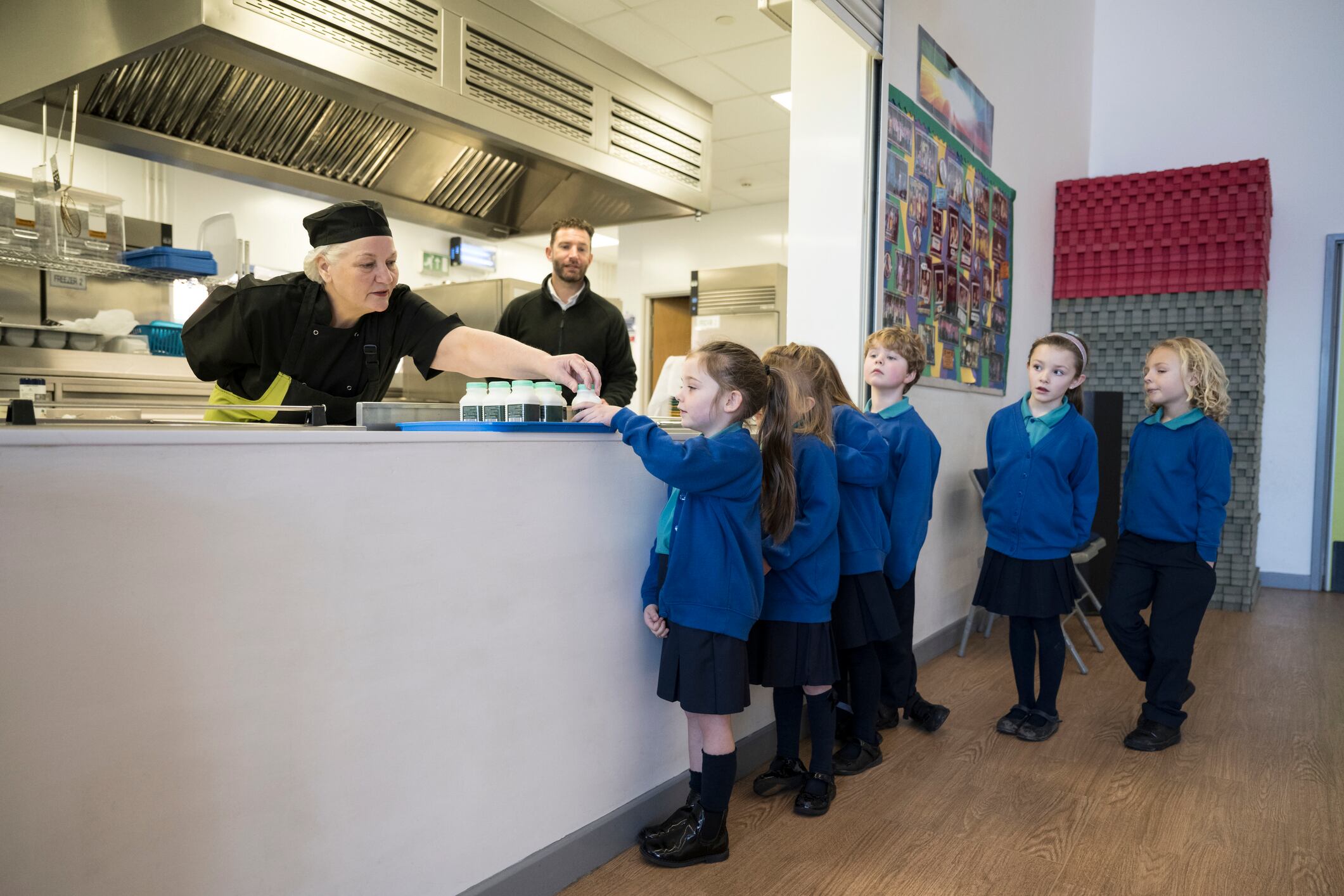Children queuing for school lunch