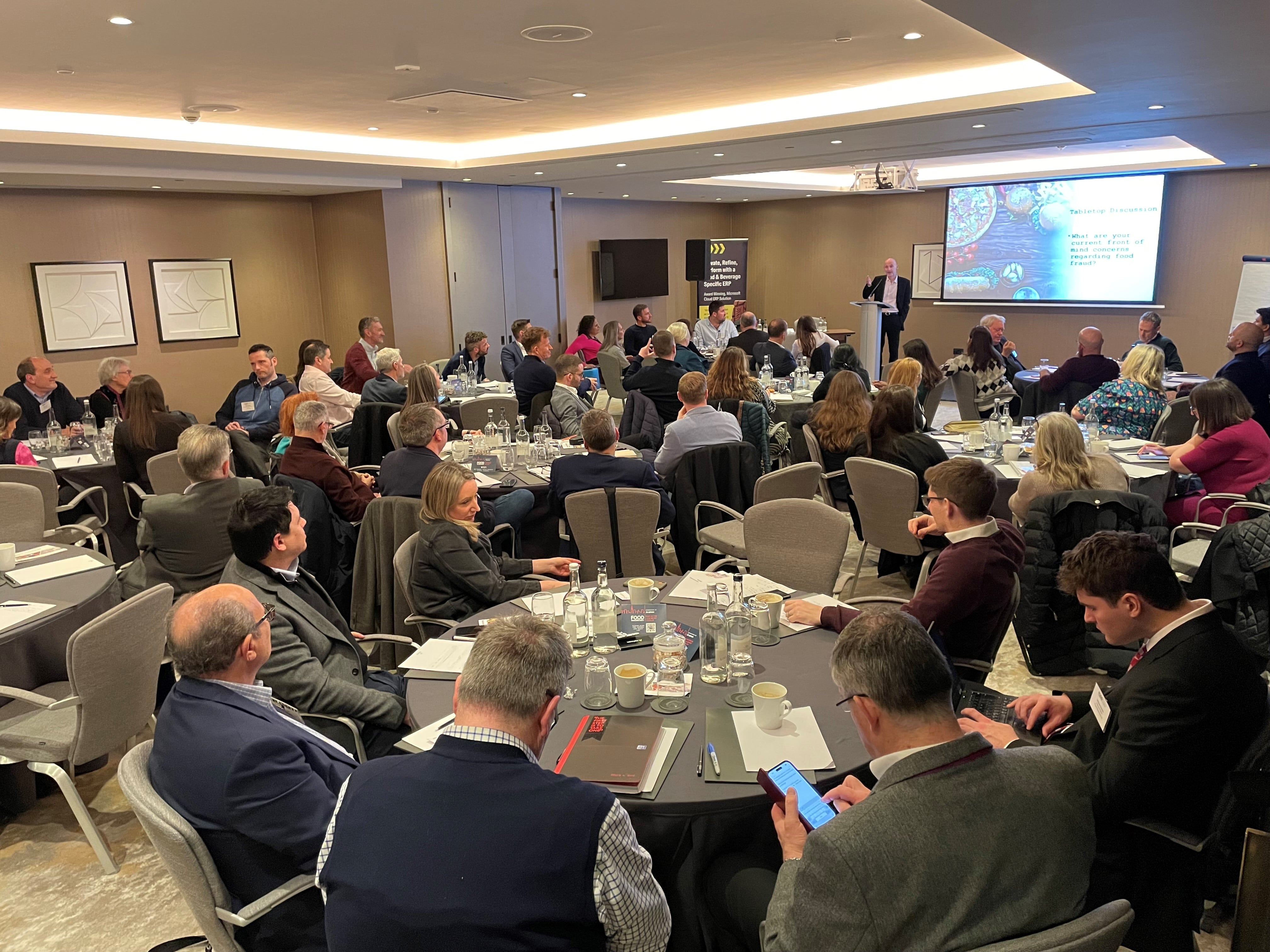 Business Leaders' Forum 2025, conference, people listening to presenter.