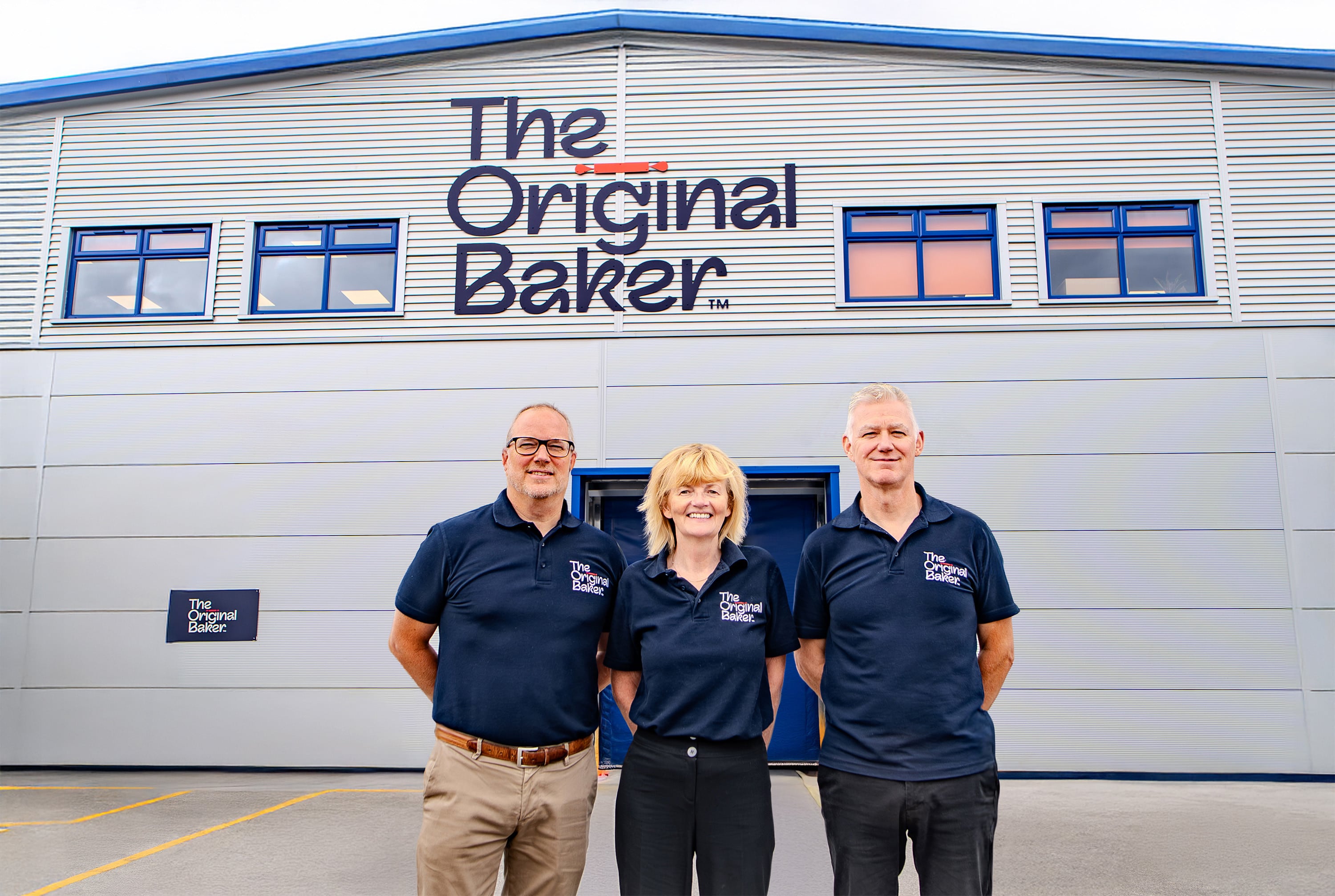 Olidor Group CEO Andrew Ashby (left) stands with The Original Baker’s director & co-founder Cheryl Barrett, and MD Mike Walker.