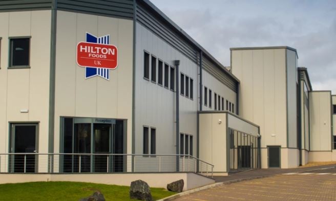 Hilton Food Solutions buys 25% stake in sausage brand