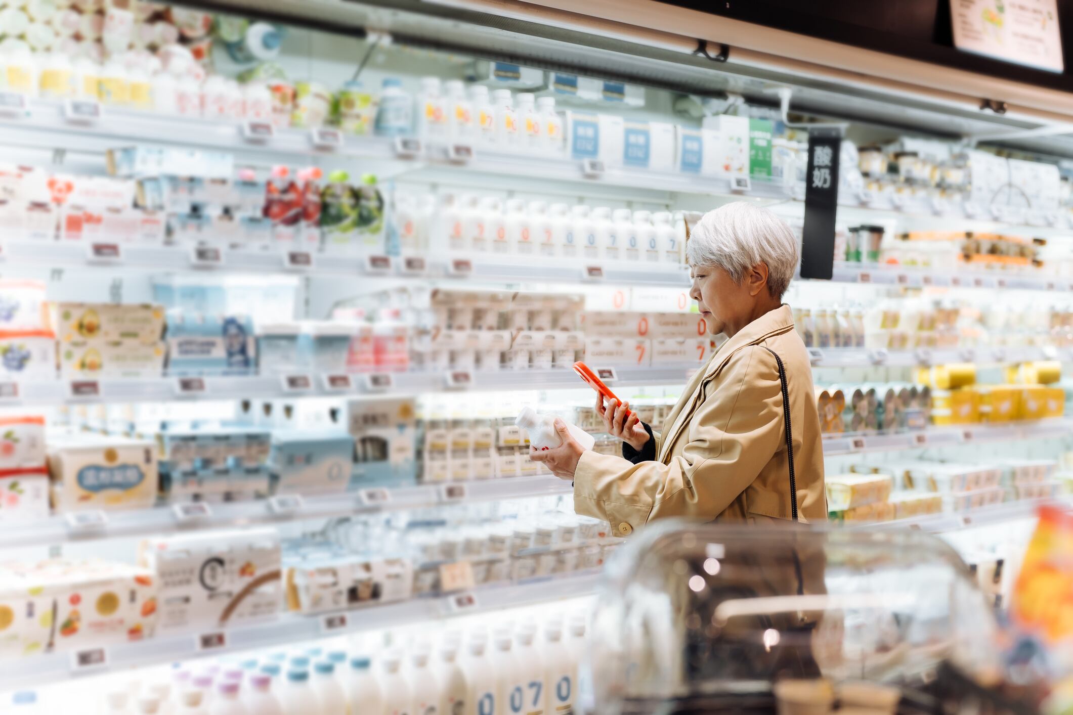 A woman shopping plant-based milk