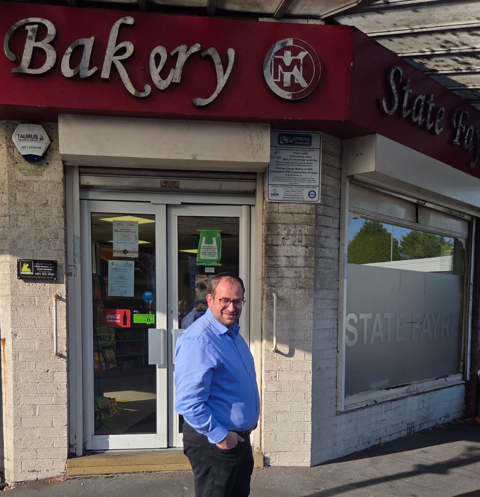 Man standing outside State Fayre.