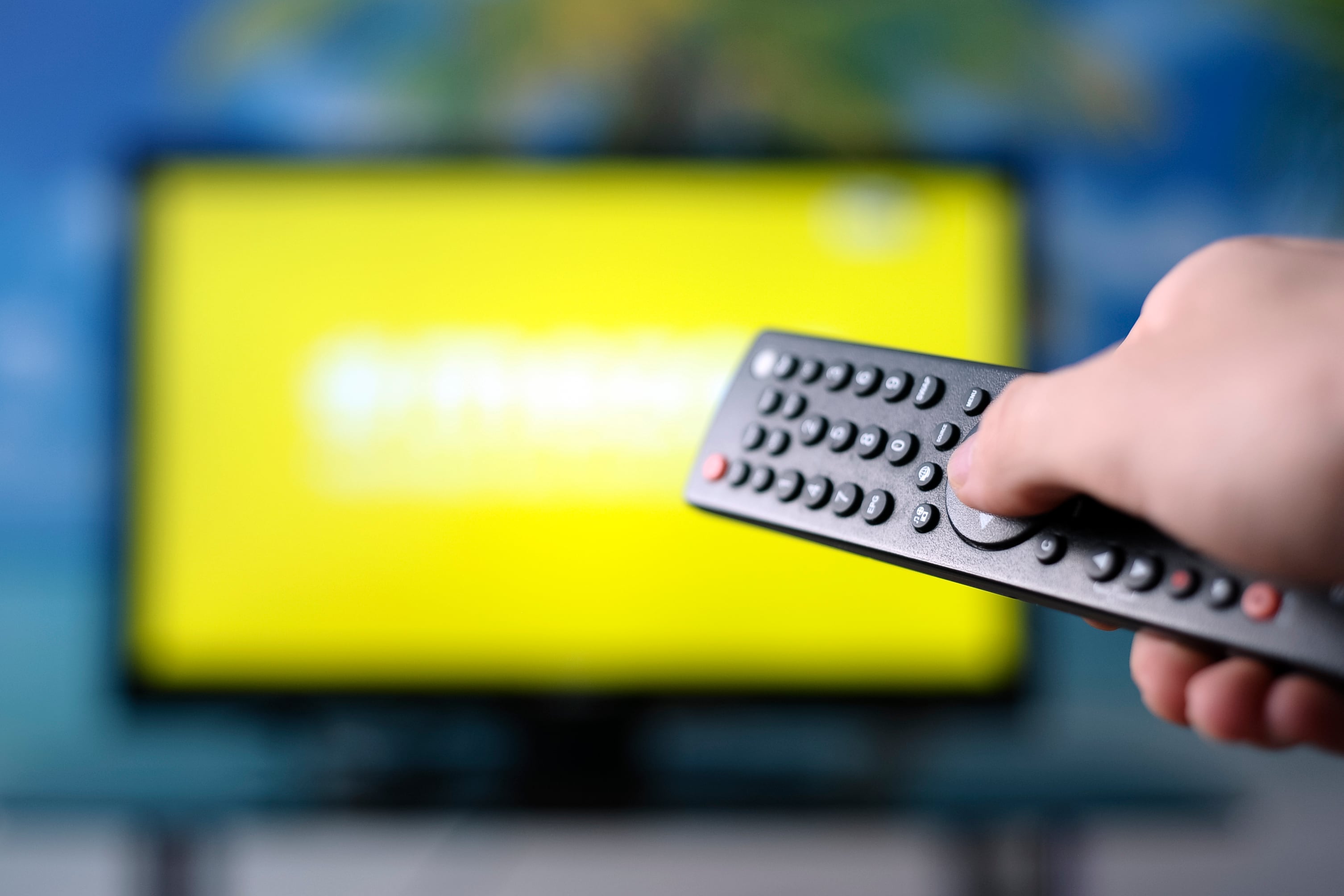 Watching TV and using remote controller