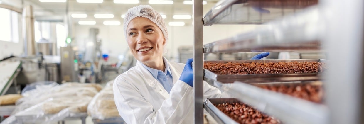 Female worker in food factory