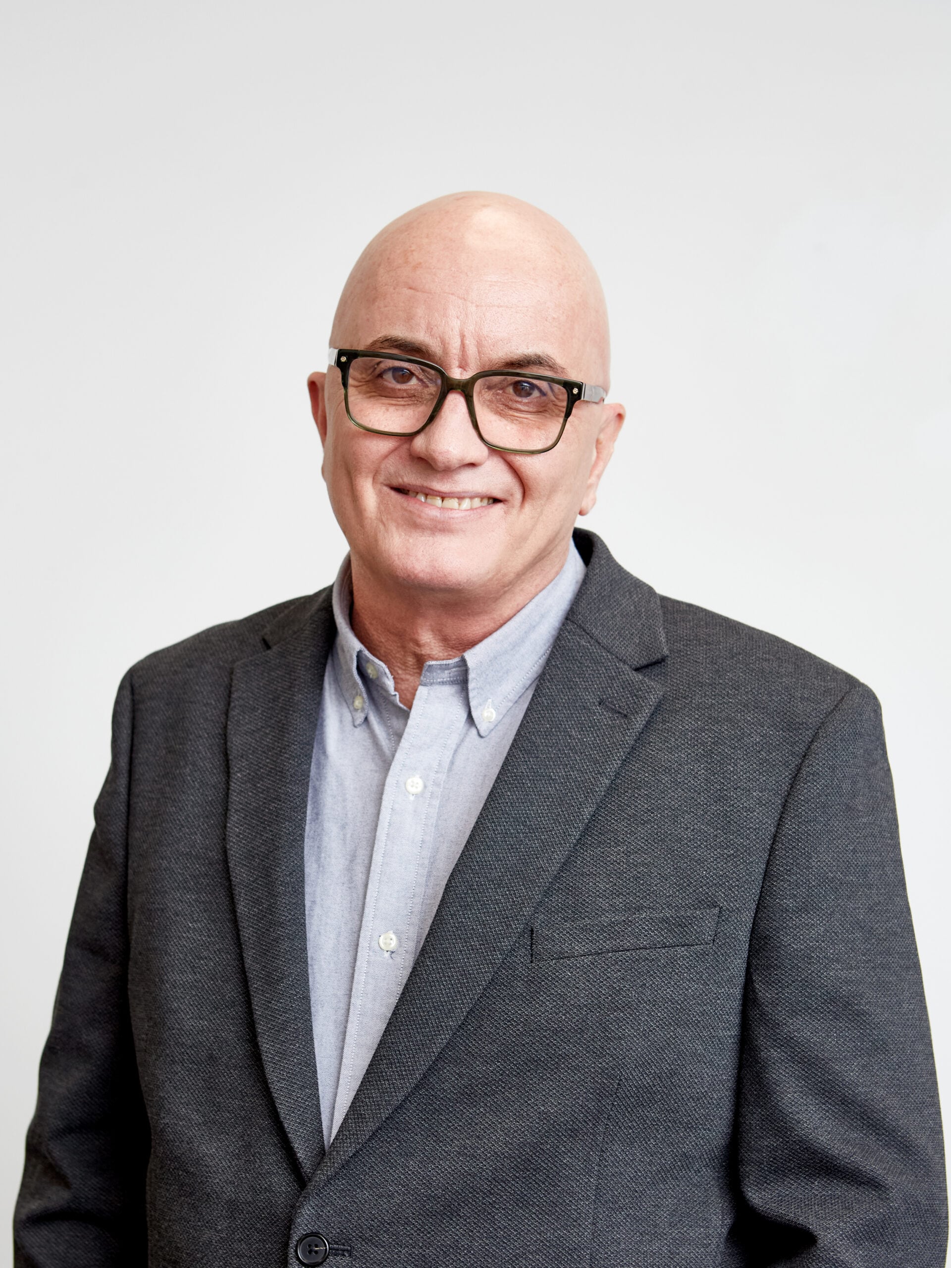 A corporate headshot of a man