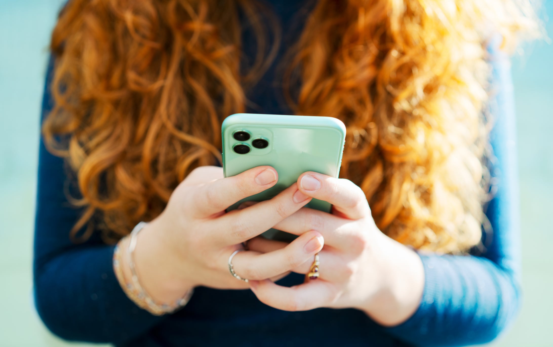 Nutrition misinformation is rising on social media as. Image: young woman looking at social media on phone