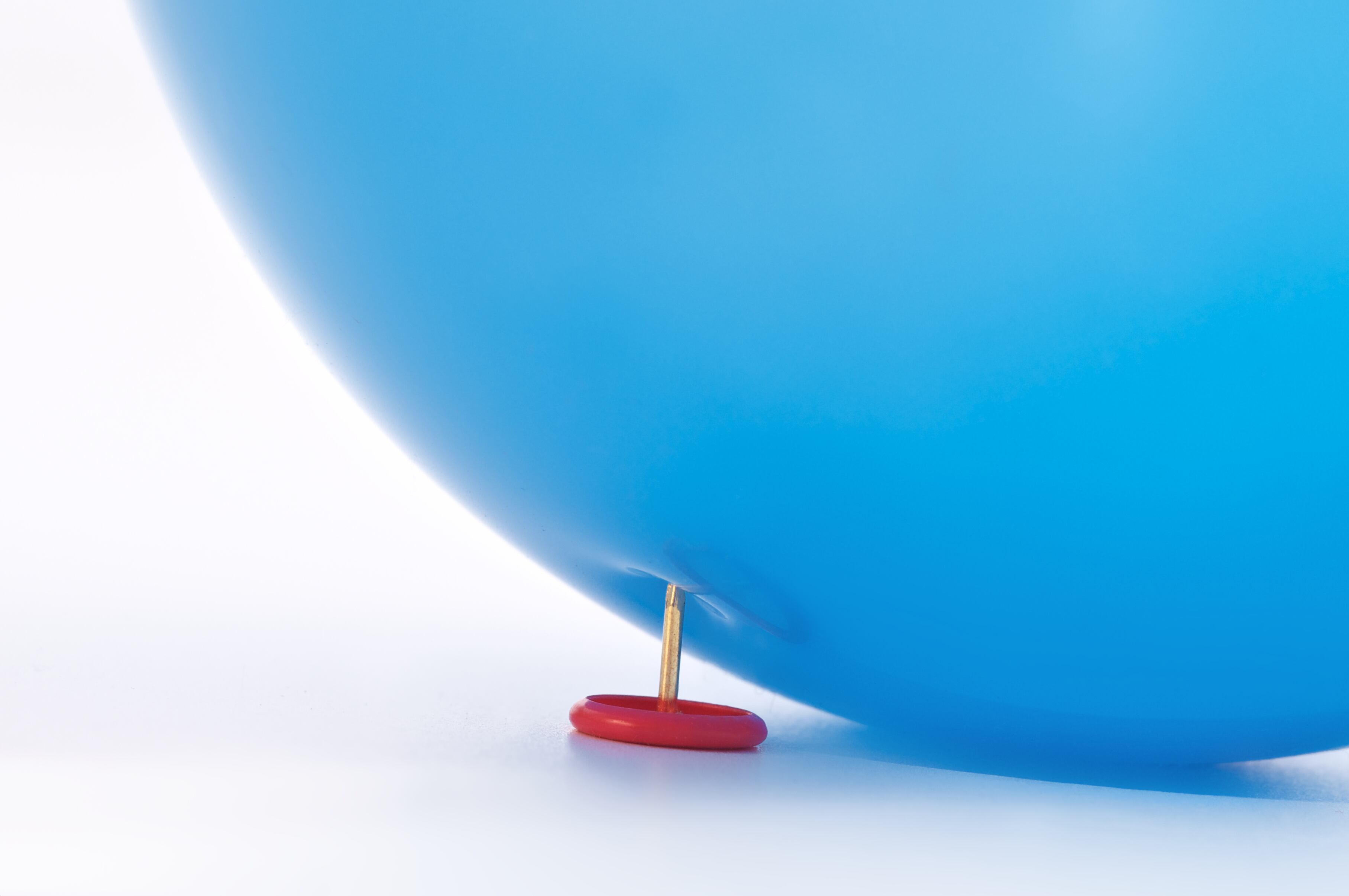 Bubble with pin poking in it.