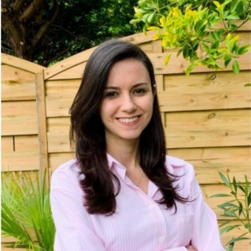 Headshot of Marina Di Migueli outside.