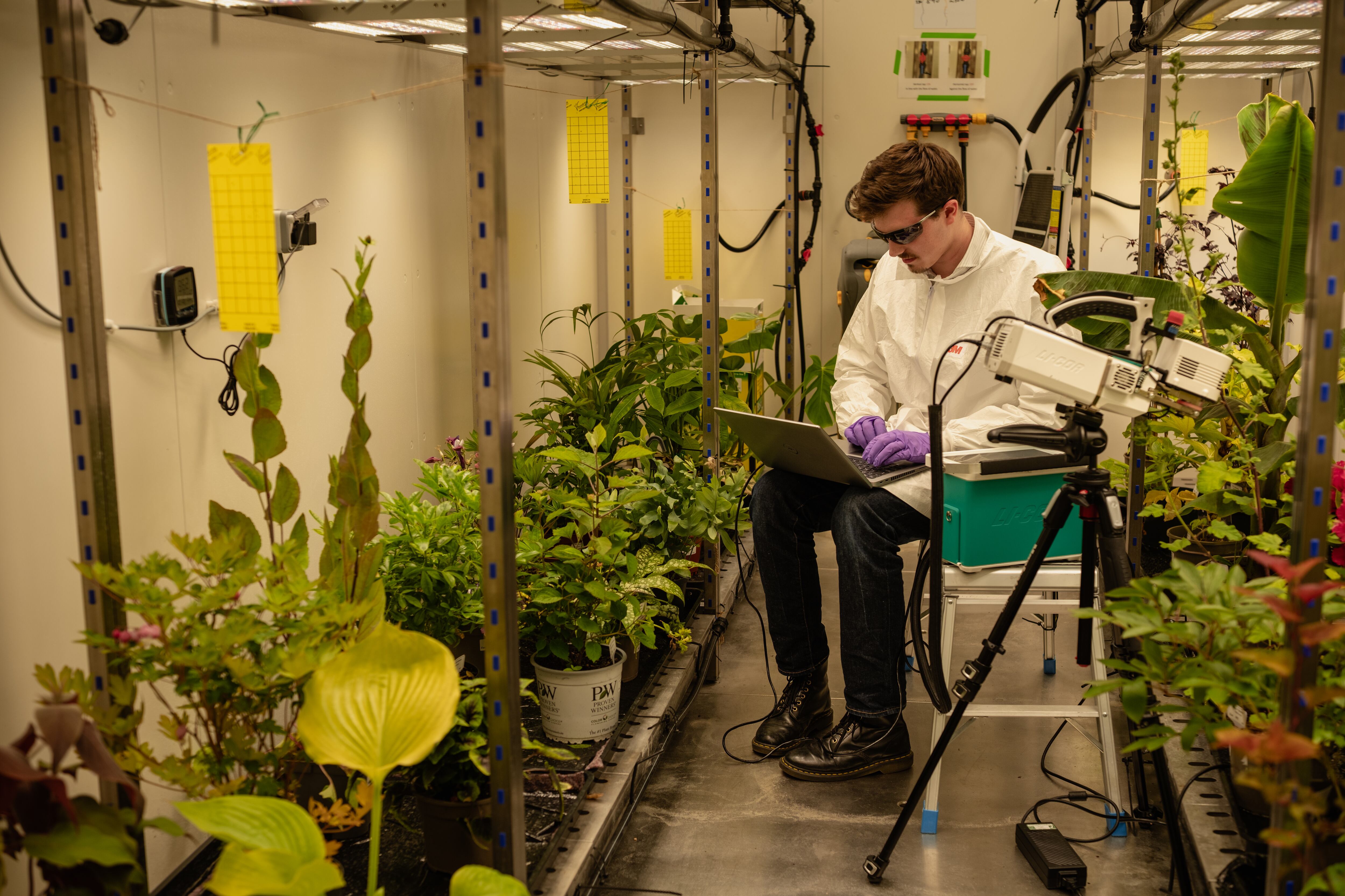 Man sitting in a lab.
