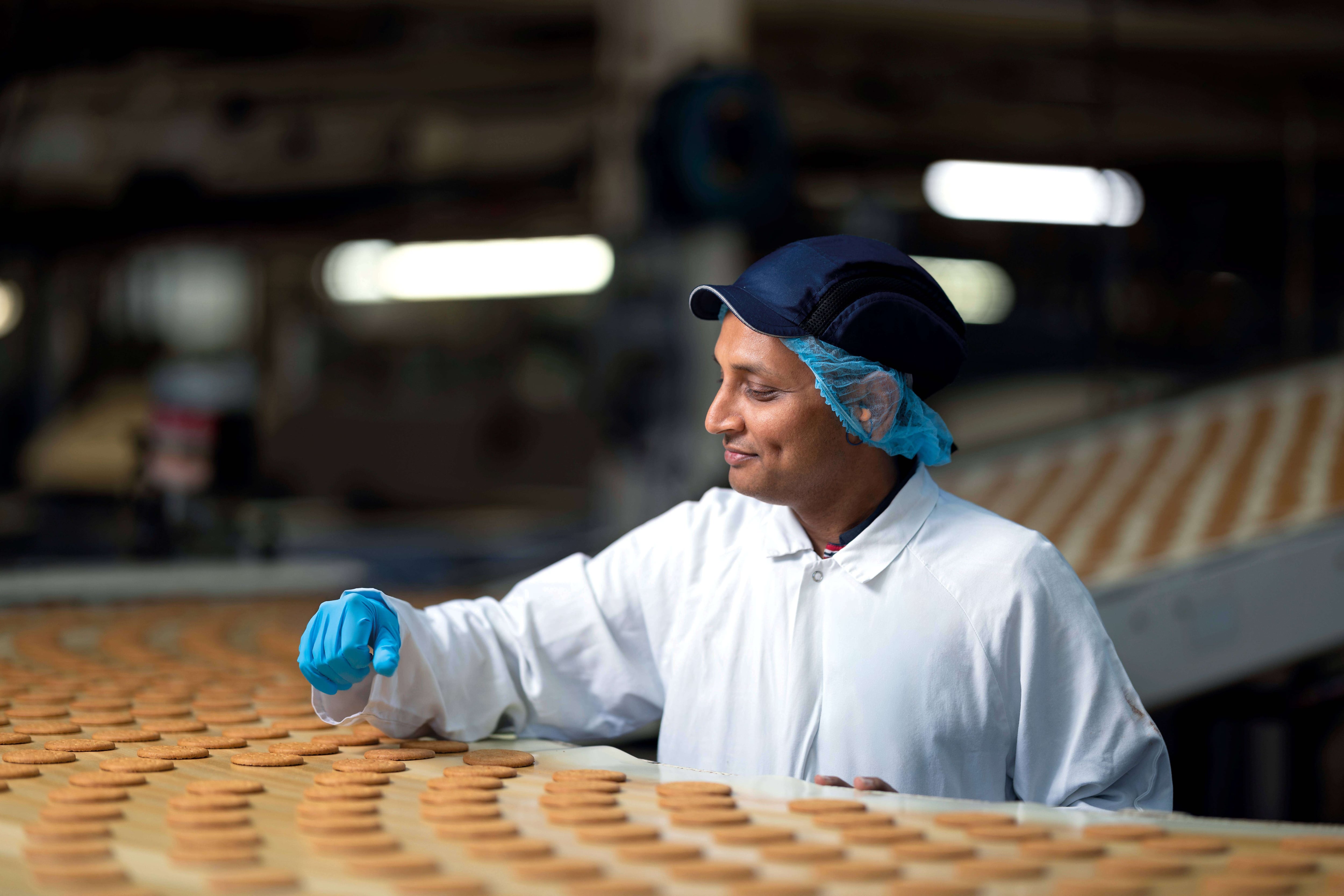 Man checking biscuits
