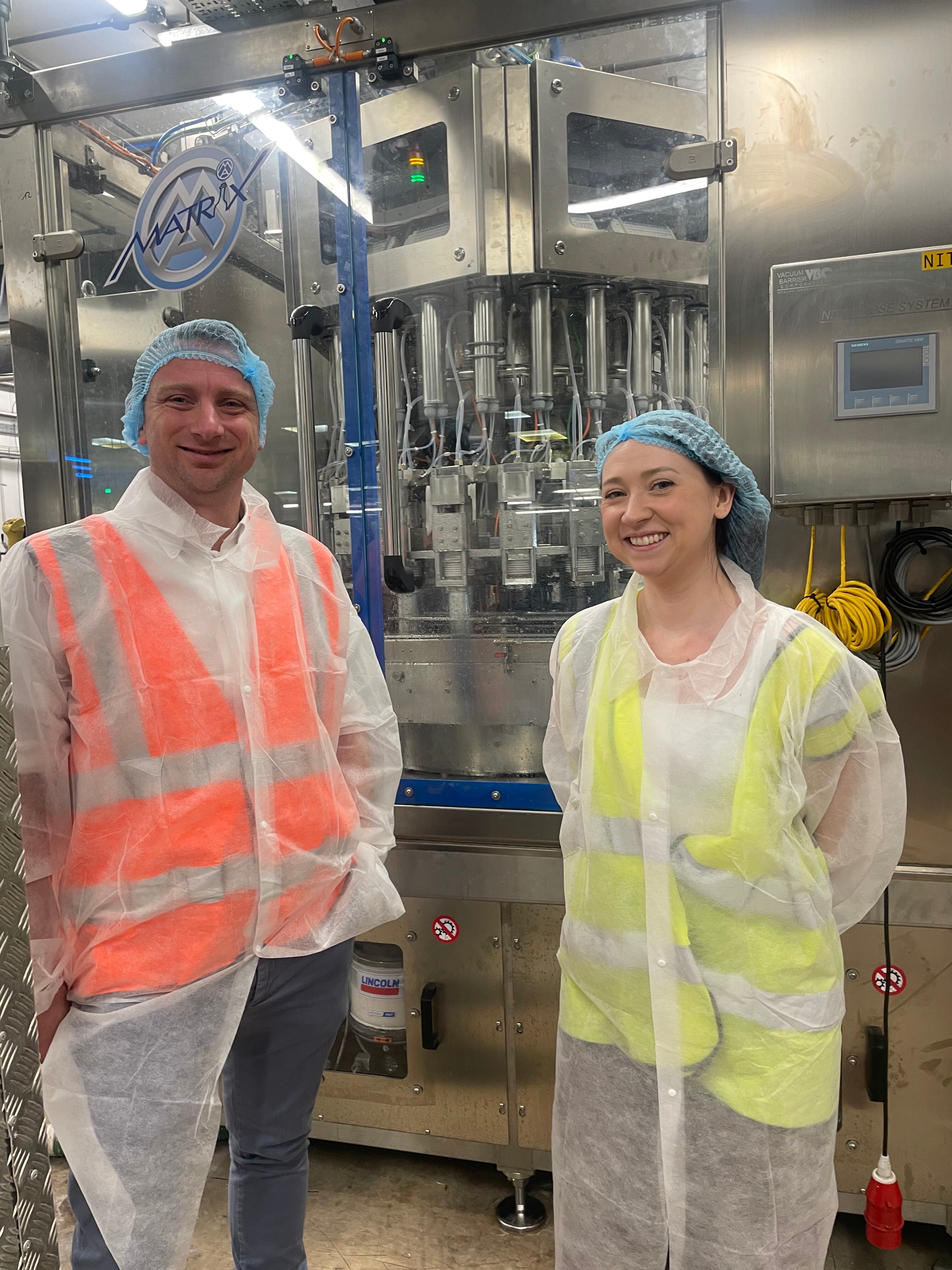 Nick Kirby and Bethan Grylls standing inside the Storefast Solutions site.