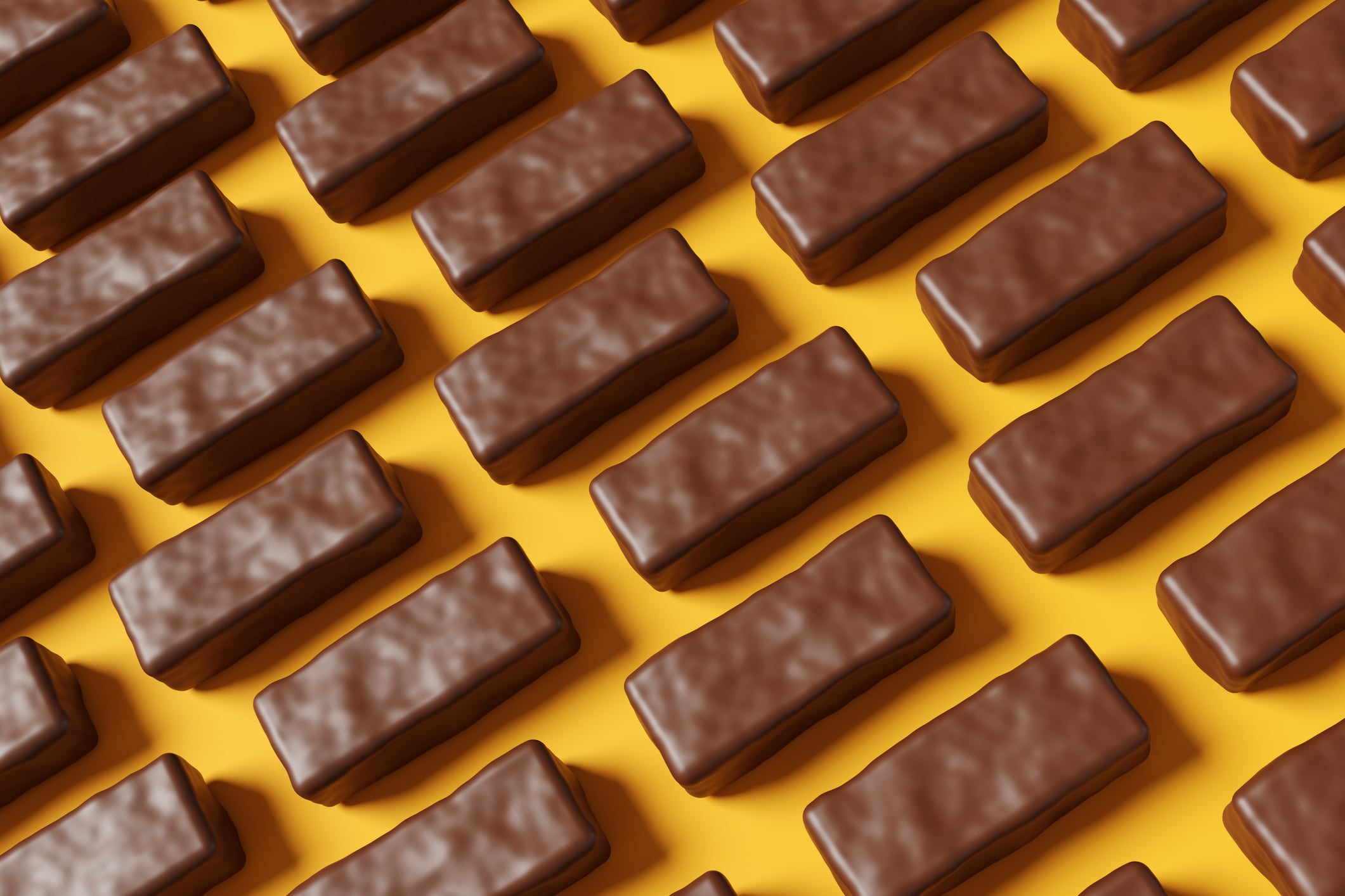 Chocolate bars on a yellow background.