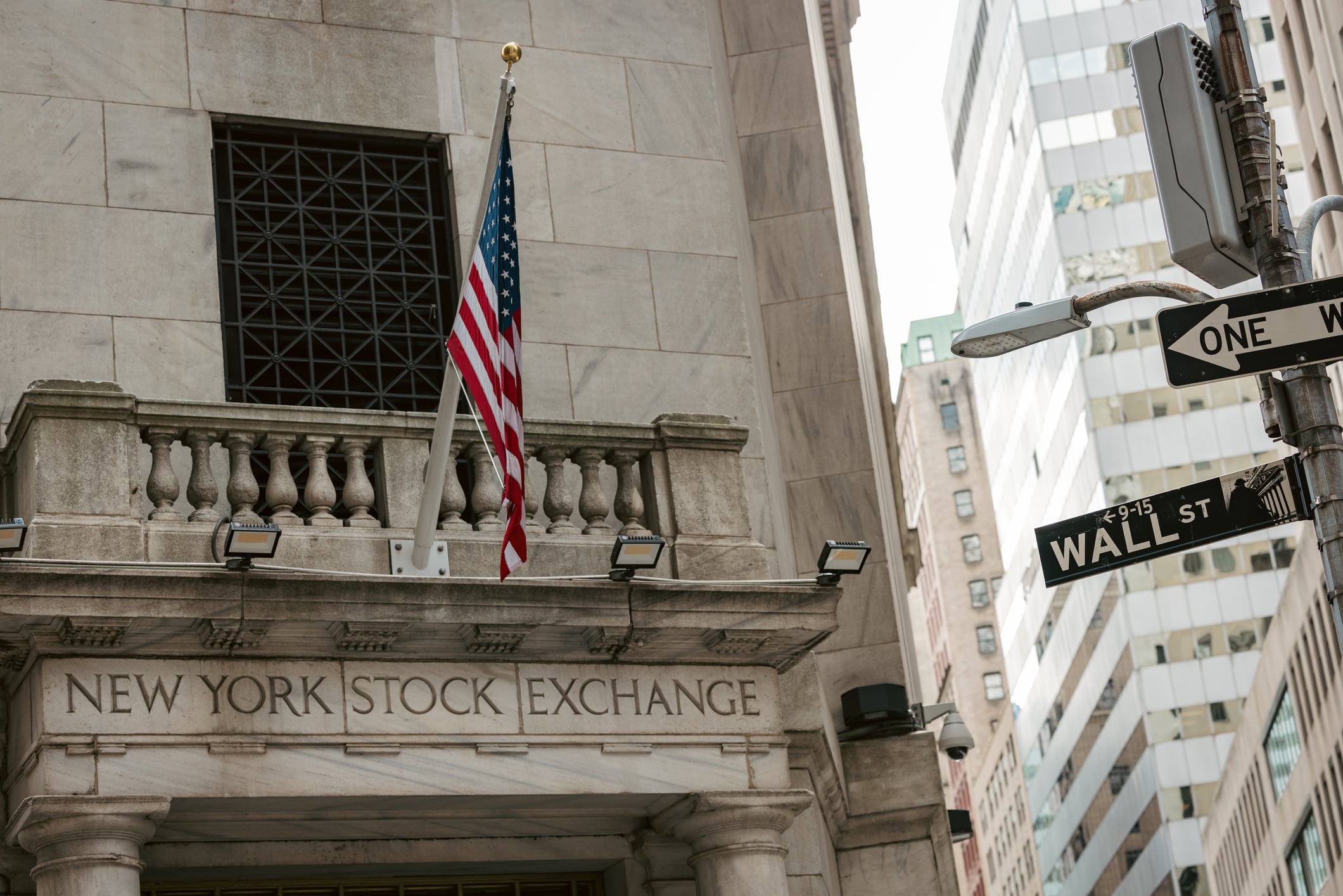 Close up image of Wall Street road sign in Lower Manhattan, New York City