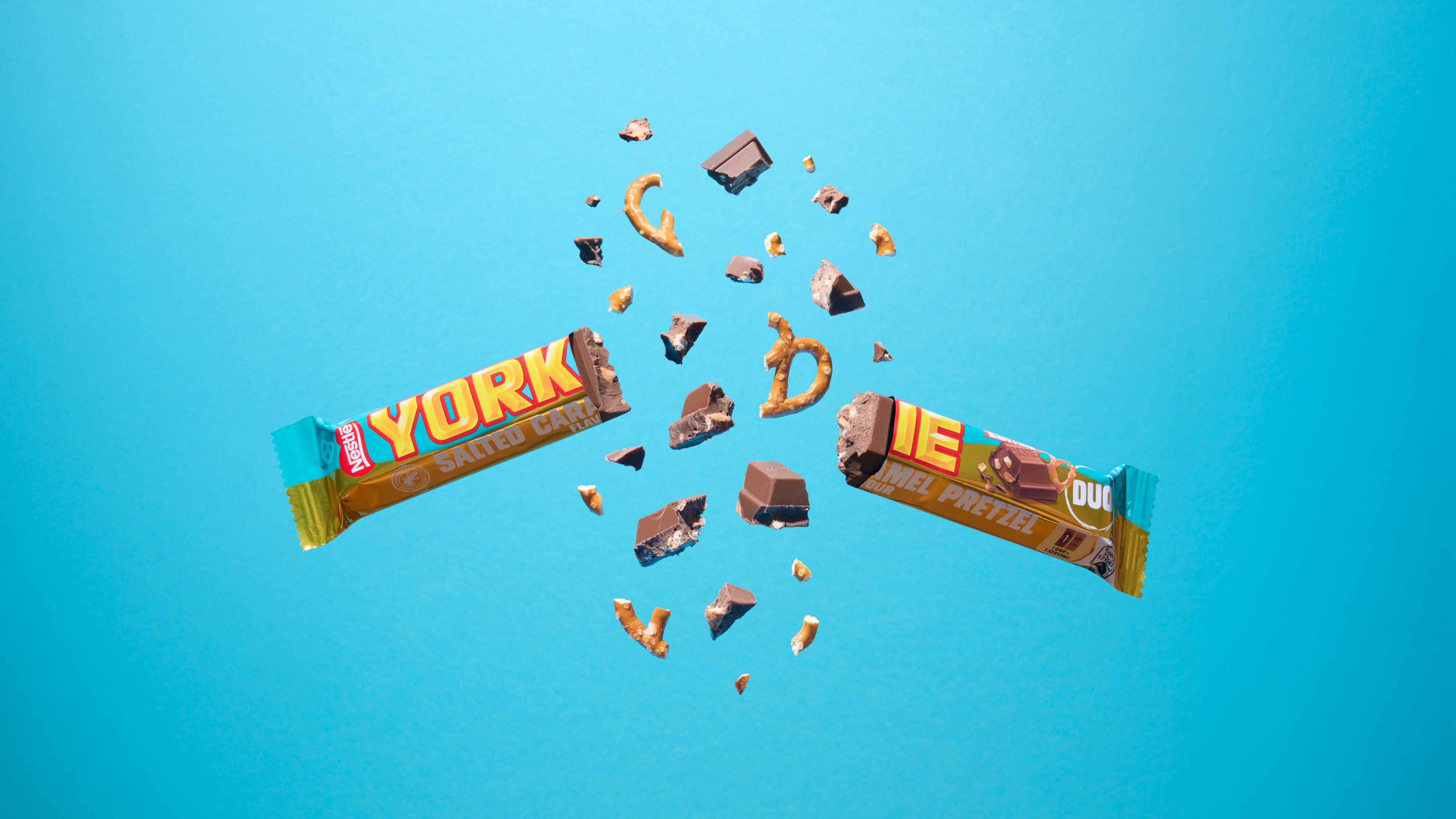 Yorkie bar being broken in half.