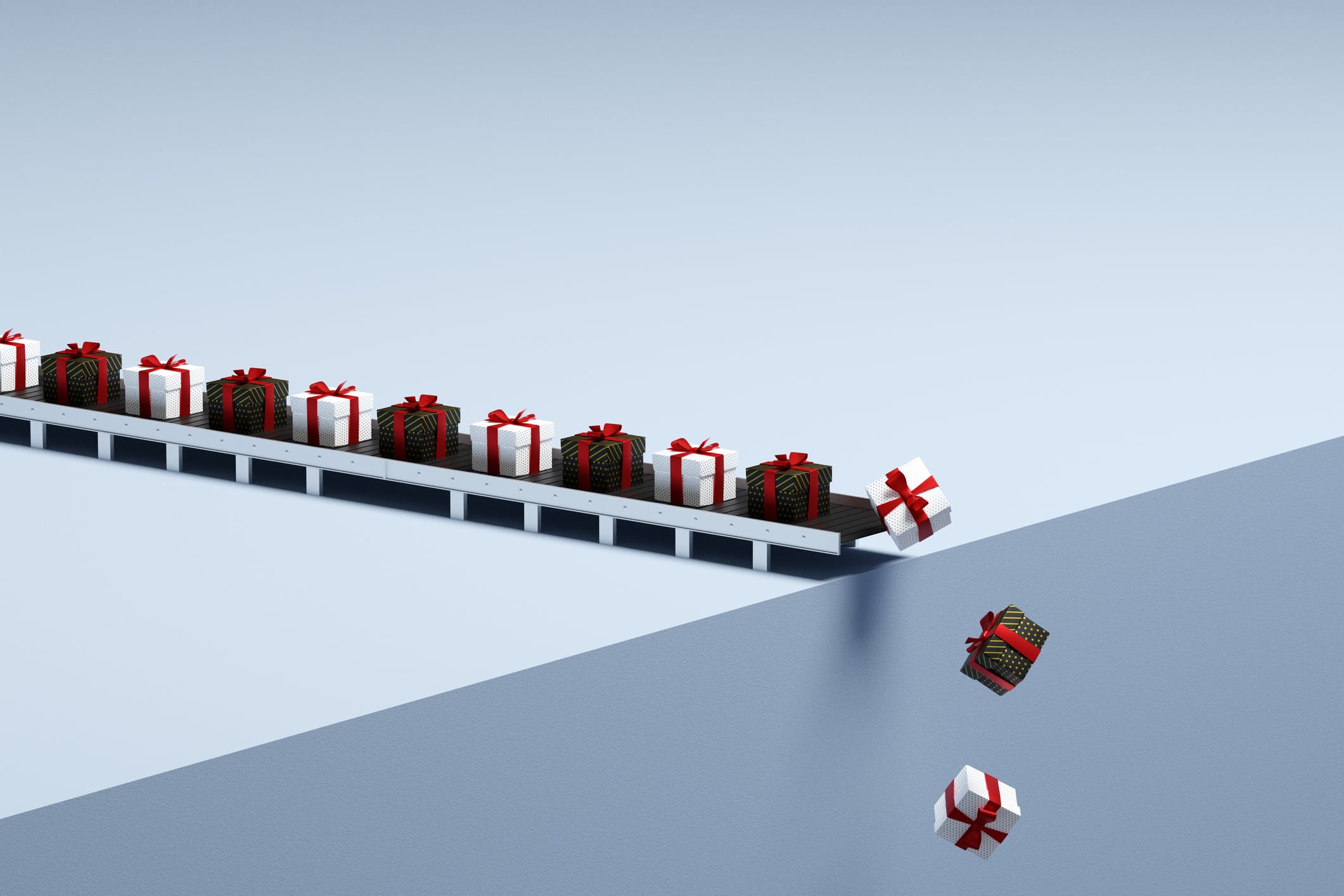 Conveyor belt dropping gifts over the edge.