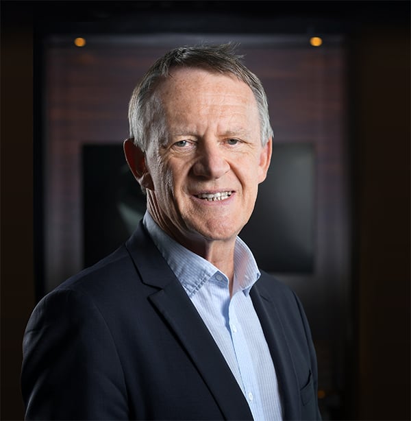 The corporate headshot of a man