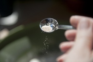 GettyImages-645387025 yeast pouring from a spoon