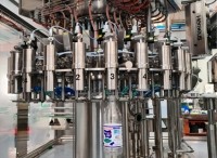Operating at speeds of up to 12,000 bottles per hour, the Unibloc is an ultra-hygienic rinser-filler-capper.jpg