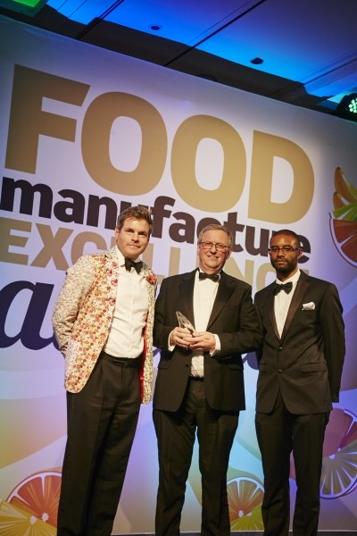 Jeremy Hall proudly cradles the Oscar received from Mark Dureden-Smith and Leon Wright of FoodManJobs