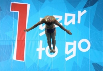 Diver Tom Daley performs the first dive at the Aquatics Centre, developed for the London Olympics