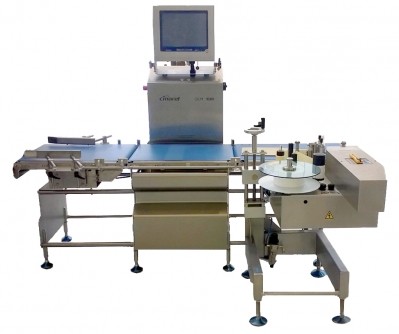 Box labeller for wet and dry food applications
