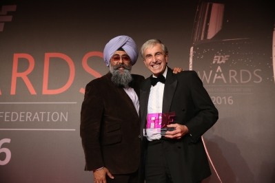Gordon Wiseman, senior research associate with Premier Foods, receives the Food & Drink Scientist of the Year Award from Hardeep Singh Kohli