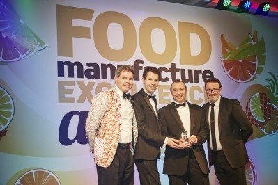 Best in beverage: CCE's Nicholas Nixon and Trevor Newman (centre L and R)  collect the award from Foodex's Dan Dixon (R) and awards host TV presenter Mark Durden-Smith