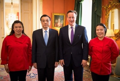 Powerful friends: Helen (L) and Lisa Tse recruited China's premier Li Keqiang to promote their Chinese sauces, after cooking for him and David Cameron