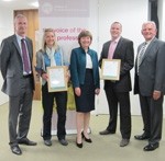 Holly Russell (2nd left) and Anthony Gorman (2nd right) from Natures Way Foods receive their RSciTech certificates