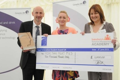 Cheque this out: Sainsbury's Alex Kyriakides (left) with last year's winners from Harper Adams