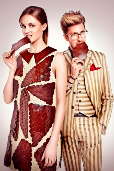 Looking tasty: Henry Holland (r) poses with a model in the dress crafted from enough chocolate to create 833 Magnum Classics 