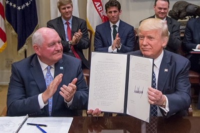Sonny Perdue pictured with his boss US President Donald Trump