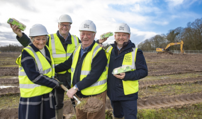 Pictured left to right: Wendy and Alan Jones cut the sod at the new Village Bakery site with Robin and Christien Jones