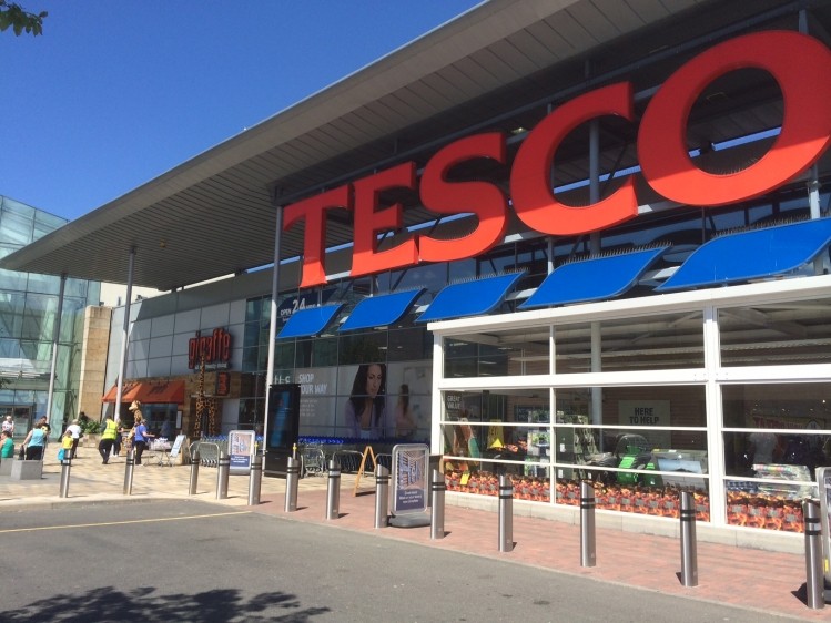 Tesco reported an annual pre-tax loss of £6.38bn