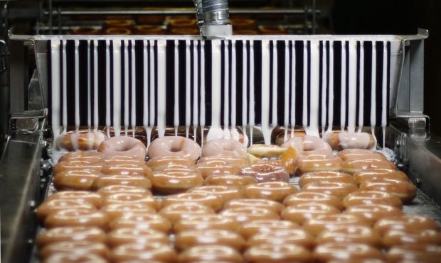 Krispy Kreme Doughnuts has been acquired for £935M by Kenco coffee owner JAB Holding