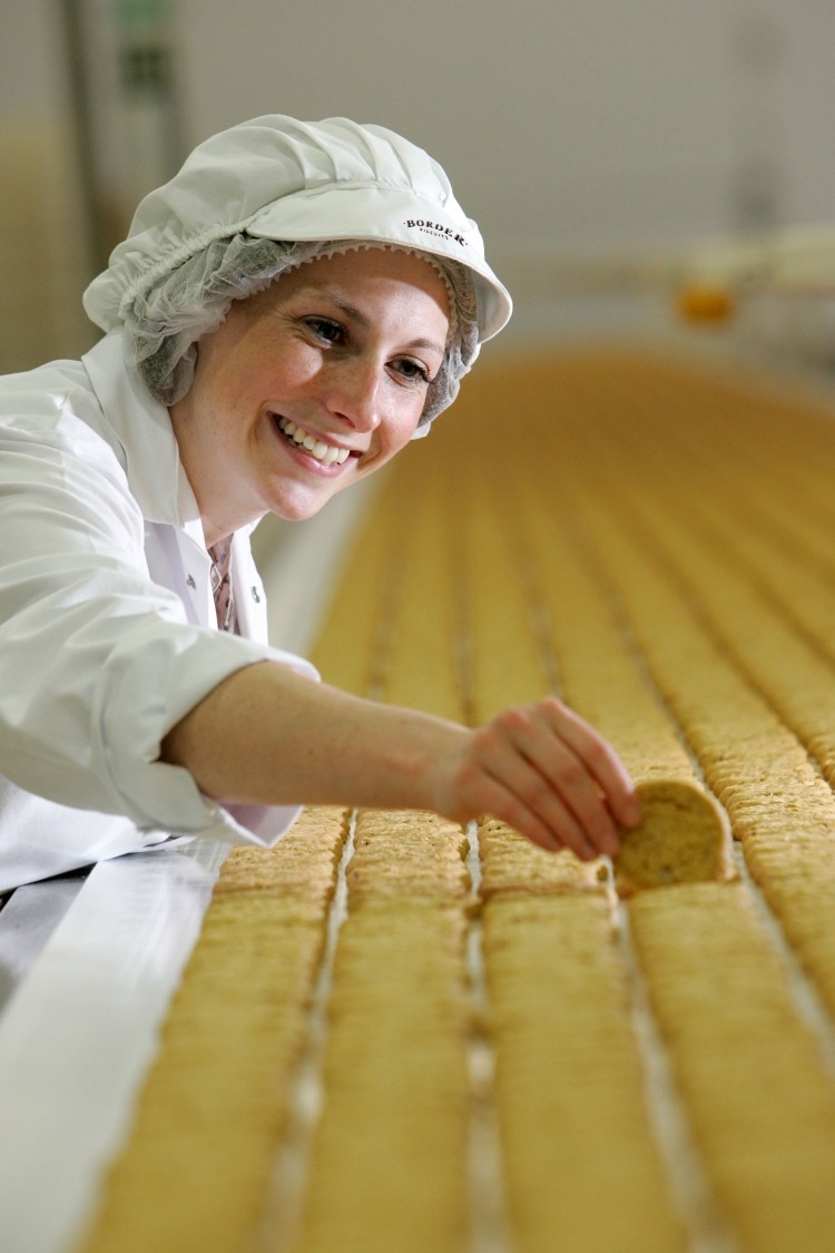 Hands on management: Nicola Hainie, Border Biscuits' technical director, on the production line