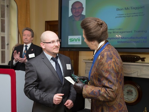 Ben McTaggart receives his award from HRH the Princess Royal