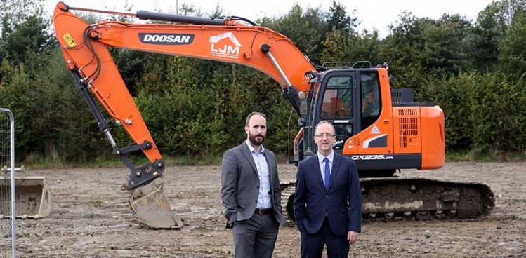 The site of the new factory at Strabane Business Park/ (L – R) Paul McGuigan, Dragon Brand Foods, and Des Gartland, Invest NI