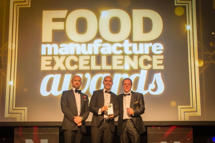 Food supply chain excellence: Stewart Wilmot collected the award from Columbus Global UK’s Simon Charlton (right) and awards host Matt Dawson