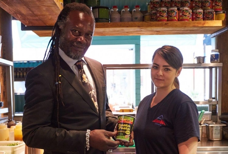 Levi Roots with Alison Wilson, research development technologist at Aimia Foods